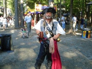 Of course, his costume might look quite authentic for a Golden Age pirate if it was dirty. However, what's even more unrealistic is that the guy is obviously middle aged. Most Golden Age pirates were in their 20s.