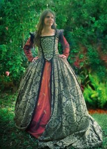 Now the outer dress is quite intricate and beautiful. However, I'm not sure about the dress underneath. Kind of think you shouldn't wear two patterned items of clothing at the same time.
