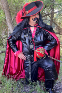 He's supposed to be a dark musketeer. But I wouldn't be surprised if he had a sex dungeon in his basement. Not that there's anything wrong with that. Well, unless he doesn't keep it safe, sane, and consensual.
