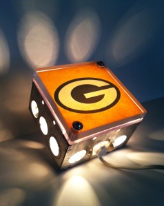 I wonder if this produces a logo like bat signal. Also, I'm sure some comic book geek wants to make one of their own only with a different shape instead of a Packers logo.