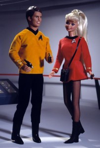 In this Ken is Captain Kirk, one of the most alien STD laden men in the galaxy. Barbie is Yeoman Rand, Kirk's main squeeze who strangely disappeared after the first season.