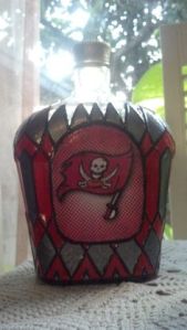 Yes, it looks like a stained glass bottle used to store alcoholic drinks. But still, pirates love their rum. And besides, it's hand painted.