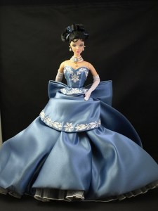 Now they have a lot of holiday Barbies out there. However, this one with the dark hair, blue snowflake dress, and cameo pearl necklace is the one I liked best.
