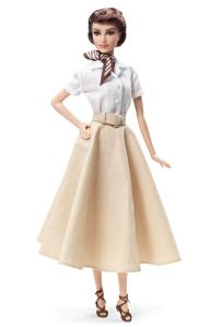 So Roman Holiday isn't nearly as famous as Breakfast at Tiffany's? Yes, the latter made Audrey into a style icon but it's a highly overrated film. Roman Holiday, on the other hand, is very charming and wonderful all the way through. Seriously. Breakfast at Tiffany's doesn't even hold a candle to Roman Holiday.