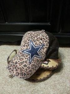 Now an NFL licensed baseball hat is one thing. But one with a sparkly logo and leopard prints? That's just insane. Seriously, that's the tackiest baseball hat I've ever seen.