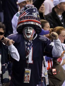 Yeah, I know the hat's a bit absurd. But at least this guy isn't wearing a Tom Brady jersey. Of course, he might bump into a door way on his way out.