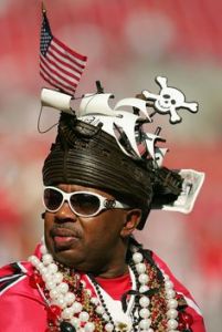 Yeah, that's a pirate ship all right. And it's on that guy's head. Not sure how it remains in good condition though. Then again, this might be the only time he wears it.