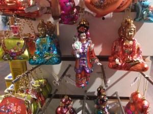 Yes, these are Buddhist ornaments. And yes, Christmas is a Christian holiday. But then again, Christmas is a popular holiday so anything goes.