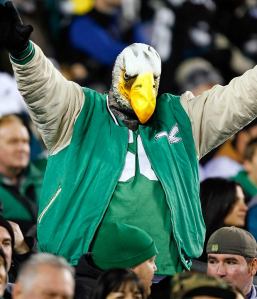 And yes, that guy's wearing an eagle head for the game. And yes, despite the gestures, he doesn't seem to carry on facial expressions too well.