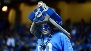 I wonder what his hat supposed to resemble. Is it some complex electric fan or an internal combustion engine?