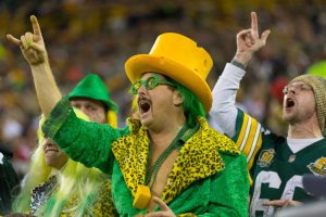 Sure the pimp costume might cause offense. But the guy looks so good with the green and yellow coat and cheese hat that I couldn't resist.