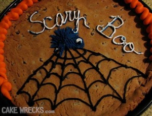 Sorry, but I don't think a spider is helping in this situation, especially if it looks like a cute little fur ball. This cake is lame.