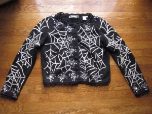 If you go clubbing or to a rave, this might be the kind of sweater you'd want to go with on Halloween. Of course, this one is tacky as hell.