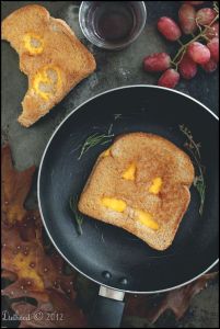 Seems like this grilled cheese sandwich isn't too happy being on the skillet. Just wait until it goes on the plate.