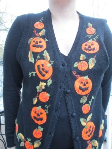 Still, that one jack o'lantern at the top doesn't seem to have much of a smile. Or at least a symmetrical one. Looks more like it's playing a harmonica.