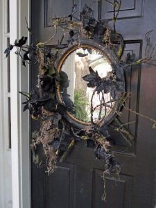 And this old mirror definitely looks like it's been in the garage for far too long. Then again, it also has black leaves on it, too. Yes, it was made like that on purpose.
