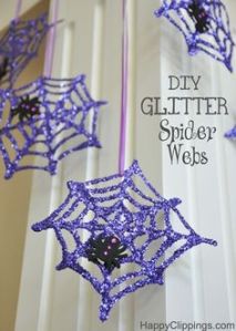 Yes, purple and glittery spider webs with spiders on them. And they're held by ribbon, too.