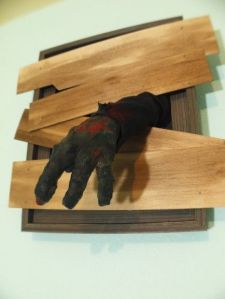 Boy, I'm sure Walking Dead fans want to have a Halloween decoration like this in their homes. Freak out the guests for hours.