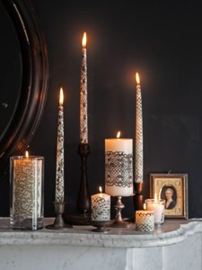 Why didn't I think about using black lace with candles? This looks awesome. Still, hope burning lace doesn't pose a dangerous fire hazard.