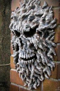 Now this is scary Halloween craftsmanship at its best. It almost looks like it's been a fixture on the house since the time it was built.