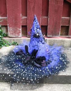 And by that I mean spiders, bat design, a black flower, black feathers, and tut material. This including the purple as well as black and sparkly kind.