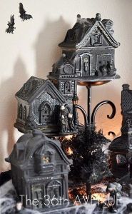 Well, painting black craft cottages is easy enough to make haunted houses. Yes, black makes things creepy, indeed.