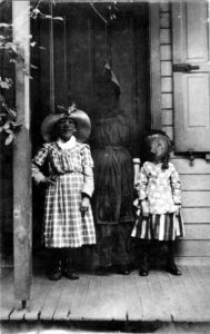 After this picture was taken, the children in the foreground were never seen again. This was no surprise as you see how the Grim Reaper decided to pose with them for Halloween.