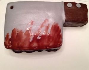 Yes, this is a bloody cleaver cake. Yes, it's quite graphic. But still, you have to give the baker credit for this.