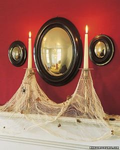Actually these consist of cheese cloths and plastic spiders on the candlesticks. They also have old leaves for a more decrepit look.