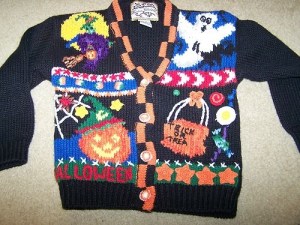Now this looks like one you'd see your elementary school teacher wearing. However, at least this one doesn't have any candy corn on it. But the witch looks blurry.