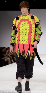 For one, because his outfit has Chinese symbols and is in that style. Second, because it's bright yellow and orange kind akin to what PennDOT workers wear.