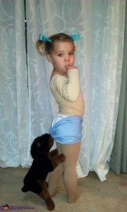 Well, the dog hanging from her butt is stuffed. Thank God. But yes, that's the Coppertone girl. 