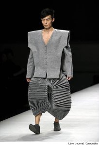 Of course, his pants just look like you can use them in an accordion. They also make him look like an idiot.