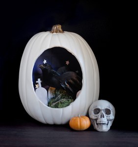 Now that's a clever idea. Not sure about the size of the bird in proportion to the grave stones. But, hey, it works.