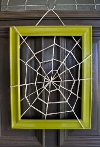 Now this looks quite simple to make. Just get some string and a picture frame. Then again, it might be a not at easy to make a spider web as it seems.
