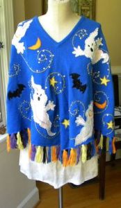 And it seems this one is in bright blue and decked with ghosts and bats. Seems that the ghosts are trying to be quite scary. Not sure if they are. Probably not.