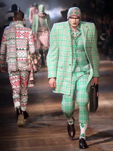 Odd that he doesn't have his clubs with him. Then again, I'm sure NFL linebackers don't dress this way on the golf course. I just think it's funny.