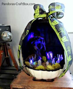 From the view in this picture, this scene looks quite menacing, especially with the skeleton in the coffin and the other surrounding him. Still, you have to love the bow on this.