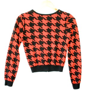 Sorry, but houndsooth is a pattern for business attire. Not for Halloween attire. And bright orange, seriously?