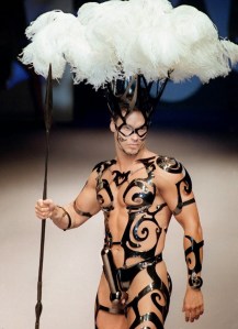 My apologies to any Native Americans living in Las Vegas because I don't mean to insult your native culture. But still, the guy is wearing a hat you'd see on a Vegas showgirl and he's certainly in warrior apparel. Just can't ignore that.