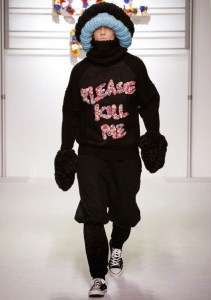 From what his shirt says, this guy must have major issues. Then again, the outfit is pretty ridiculous.