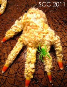 Now this is perhaps one the few Halloween treats on here that I've been familiar with as a kid. The candy corn are the nails while the popcorn is everything else. And it's all held up in a glove.