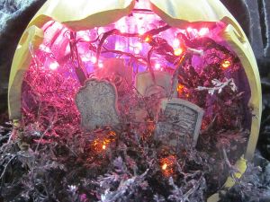 Now this looks quite messy with all the lights mangled for a pink glow sky and the ground that appears covered in last year's Christmas decorations. Still, quite appropriate for Halloween.