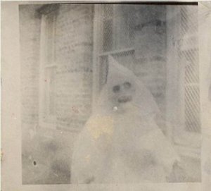 Yeah, sometimes the heavy urban pollution can make some people look scarier than they appear. The kid in a ghost costume is one of them.