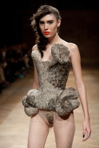 Yeah, she kind of does look like she's wearing a skimpy snakeskin outfit. Yes, it's pretty ridiculous and certain to earn the ire of PETA.