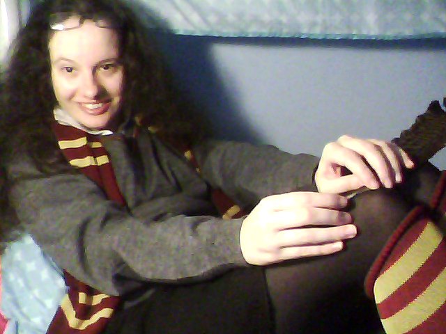 Now this might not be quite DIY but it's good enough. This is my Hogwarts school girl costume that I wore for Halloween all 4 years in college. Now the scarf, knee socks, and shirt were a gift I received from my uncle and aunt in Florida. The black tights, black skirt, and white polo shirt are straight from my wardrobe. And the quill is a turkey feather from my neighbors, I think. Still,  I decided to go with a sexy costume pose for this post.