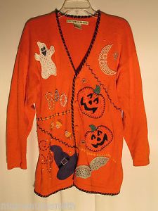 Looks like something a kindergarten teacher would wear. Still, why does the ghost have spots? Oh, i'ts to make it sparkle. Right.