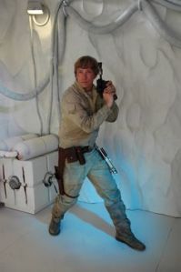 Of course, both take two hands to operate. One of which Darth Vader cuts off before he tells Luke that he's his father.