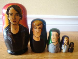 Now this set includes Katniss, Peeta, Gale, Prim, and Rue. Of course, this is from the first book though.