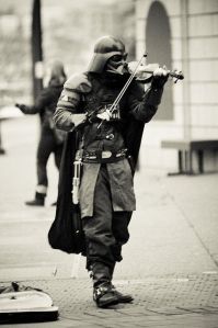 Not sure if a street musician in a Darth Vader mask is bound to earn any money. That is, unless he threatens to force choke you if you don't give him any spare change or adulation.